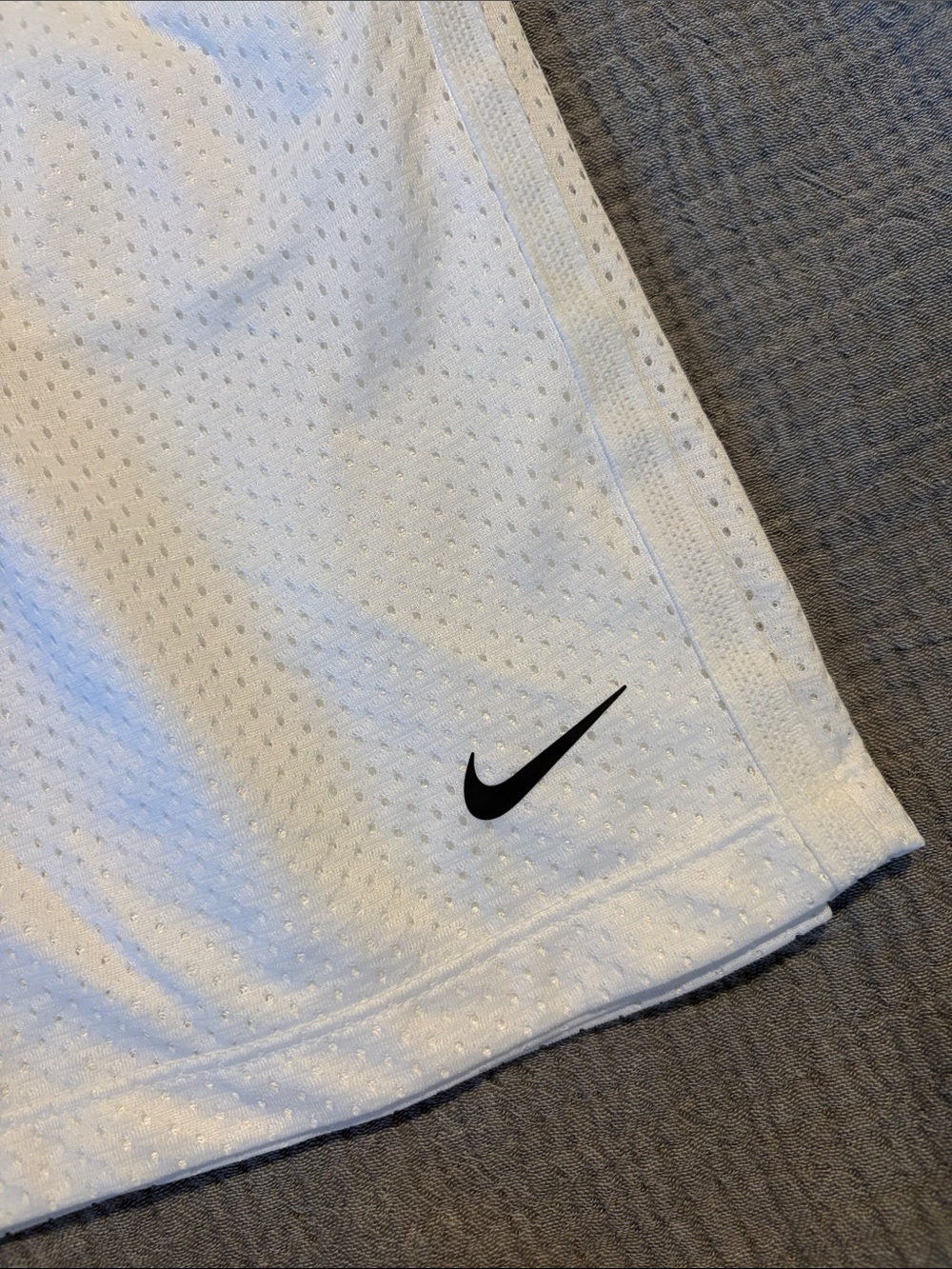 Nike White Mesh Athletic Shorts with Black Swoosh